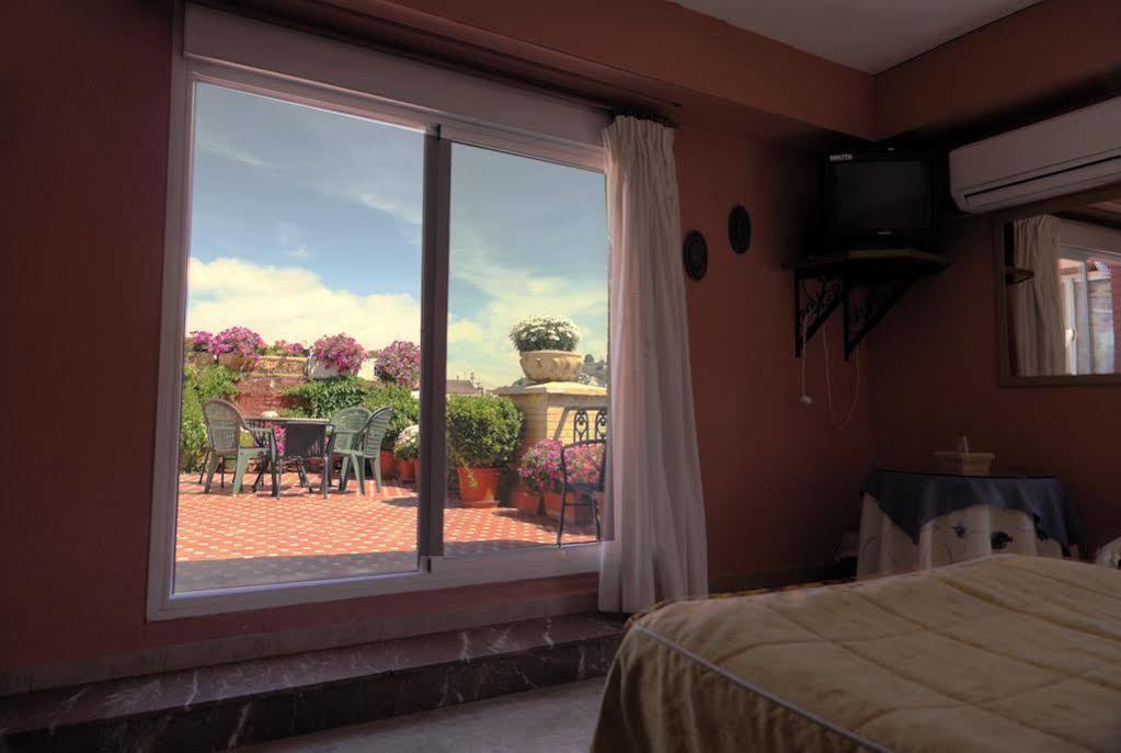 Hostal Londres Гранада Экстерьер фото